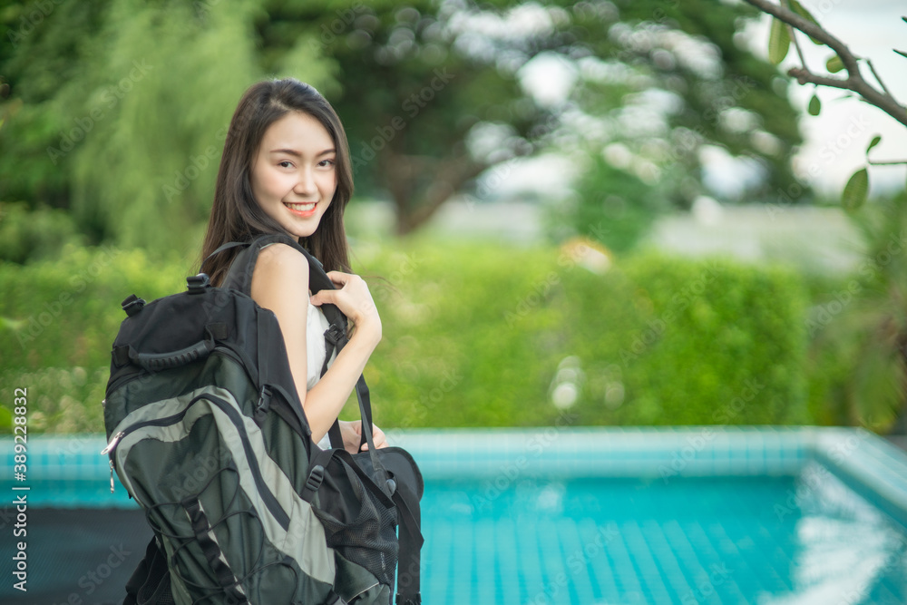Backpacker female feeling happy spending relax time in holiday trip. Lifestyle women travel in Asia city concept. Backpacker female feeling happy spending relax time in holiday trip. Lifestyle women travel in Asia city concept.