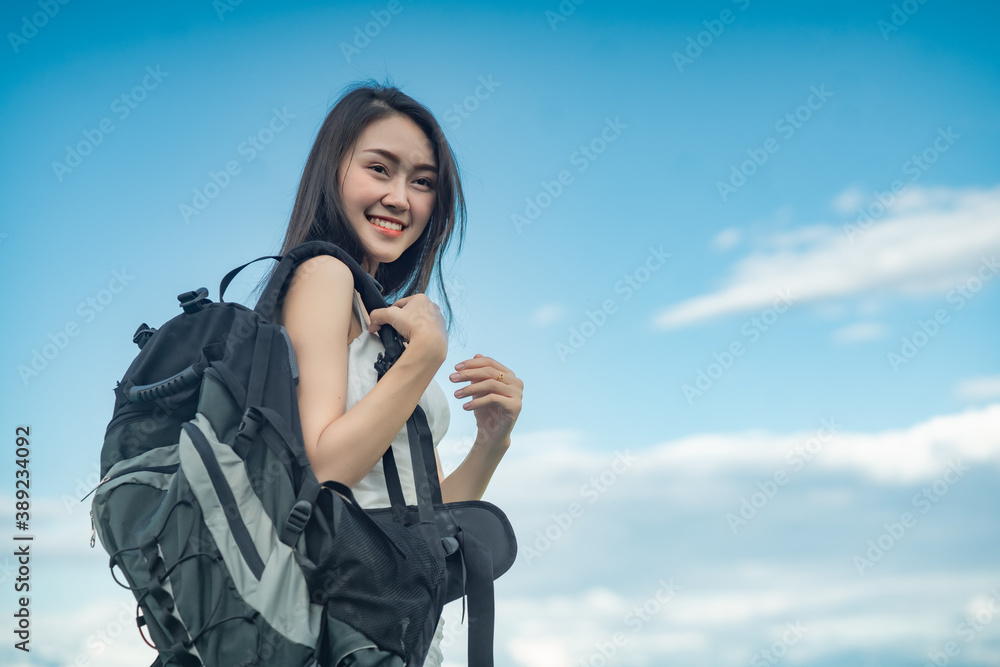 Backpacker female feeling happy spending relax time in holiday trip. Lifestyle women travel in Asia city concept. Backpacker female feeling happy spending relax time in holiday trip. Lifestyle women travel in Asia city concept.