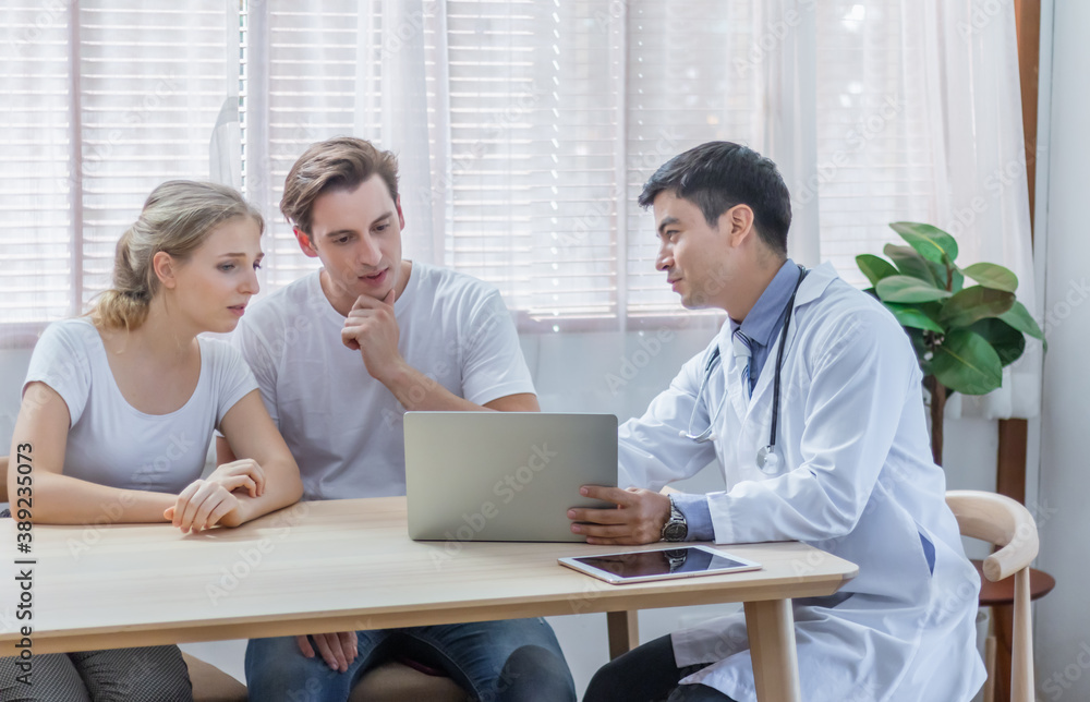 Caucasian couple patient husband and wife visit or meeting male doctor for pregnanct consultation at clinic or hospital. Lover meet medical advisor or physician for health treatment and medicare. Caucasian couple patient husband and wife visit or meeting male doctor for pregnanct consultation at clinic or hospital. Lover meet medical advisor or physician for health treatment and medicare.