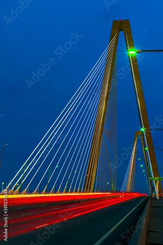 Headlights, Taillights, streaming at dusk across Arthur Ravenel Bridge.