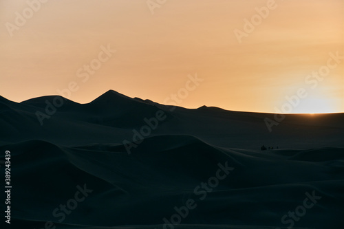 Fototapeta Naklejka Na Ścianę i Meble -  Sunset in the huacachina desert in Peru