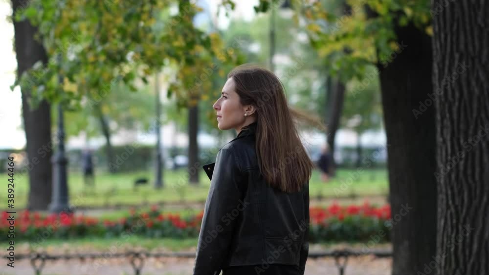 Beautiful woman walking in autumn park Beautiful woman walking in autumn park