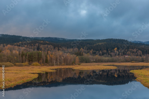 End of Lipno sea reservoir in autumn cloudy color morning