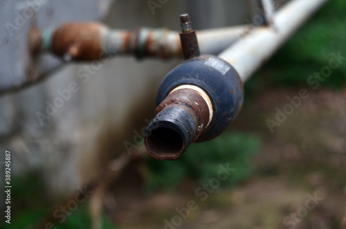 Pipe for draining water from tanks