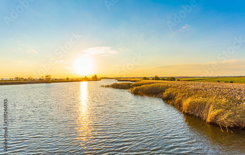 Blick auf das Naturparadies Prerowstrom / Bodstedter Bodden zum Sonnenuntergang photo