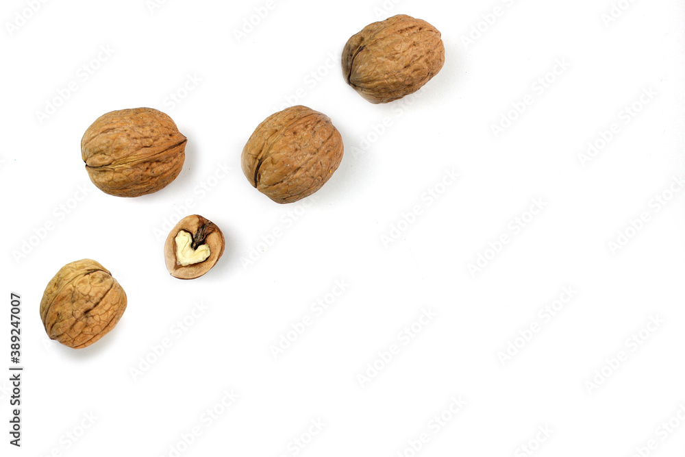 Walnuts isolated on white background. Healthy eating. Walnuts isolated on white background. Healthy eating.