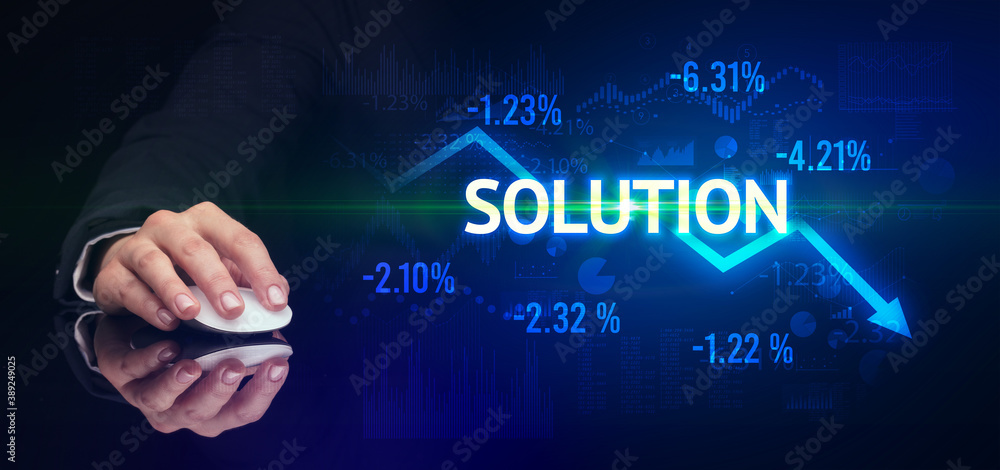 male hand holding wireless peripheral with SOLUTION inscription, modern business concept male hand holding wireless peripheral with SOLUTION inscription, modern business concept