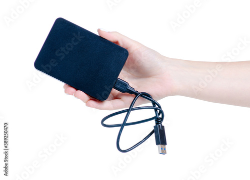 external hard drive in hand on white background isolation