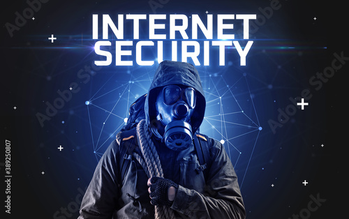 Fototapeta Naklejka Na Ścianę i Meble -  Mysterious hacker with INTERNET SECURITY inscription, online attack concept inscription, online security concept