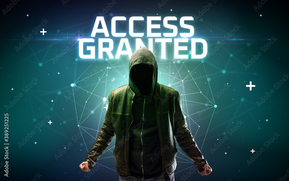 Mysterious hacker with ACCESS GRANTED inscription, online attack concept inscription, online security concept Mysterious hacker with ACCESS GRANTED inscription, online attack concept inscription, online security concept