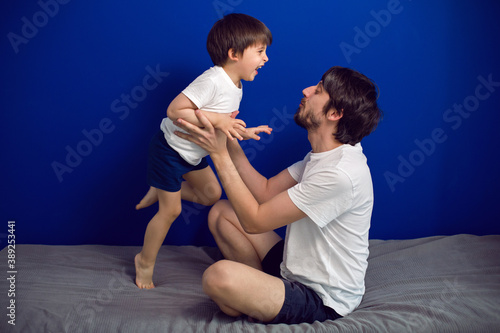 boy child with his father in white t shirts