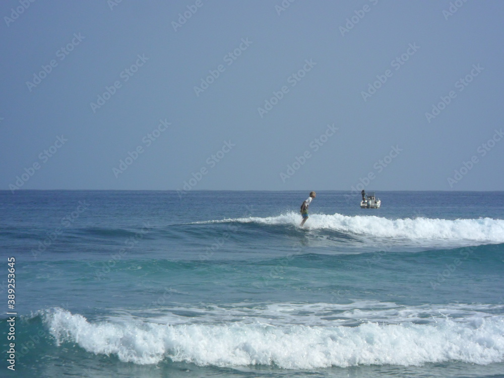 The white sandy beaches and turquoise ocean water on the coastal landscapes of Sal and Boa Vista in the Cape Verde Islands in the Atlantic, West Africa The white sandy beaches and turquoise ocean water on the coastal landscapes of Sal and Boa Vista in the Cape Verde Islands in the Atlantic, West Africa