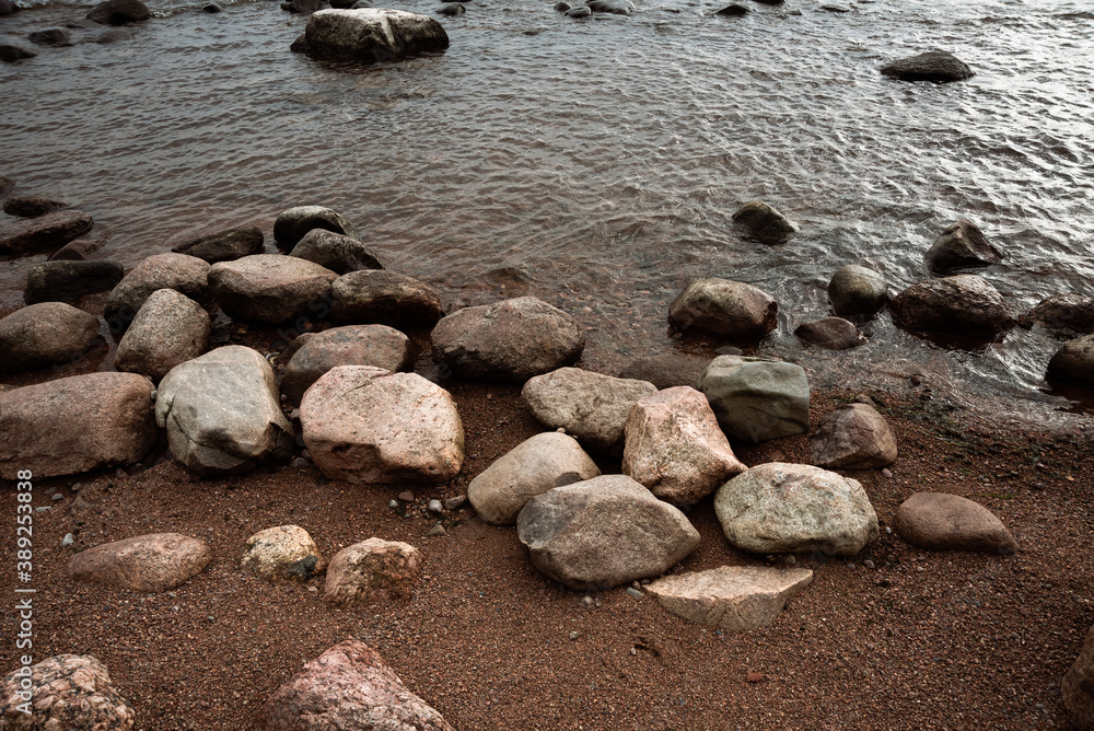 A piece of the coast of the Gulf of Finland with rocks and rippled water A piece of the coast of the Gulf of Finland with rocks and rippled water