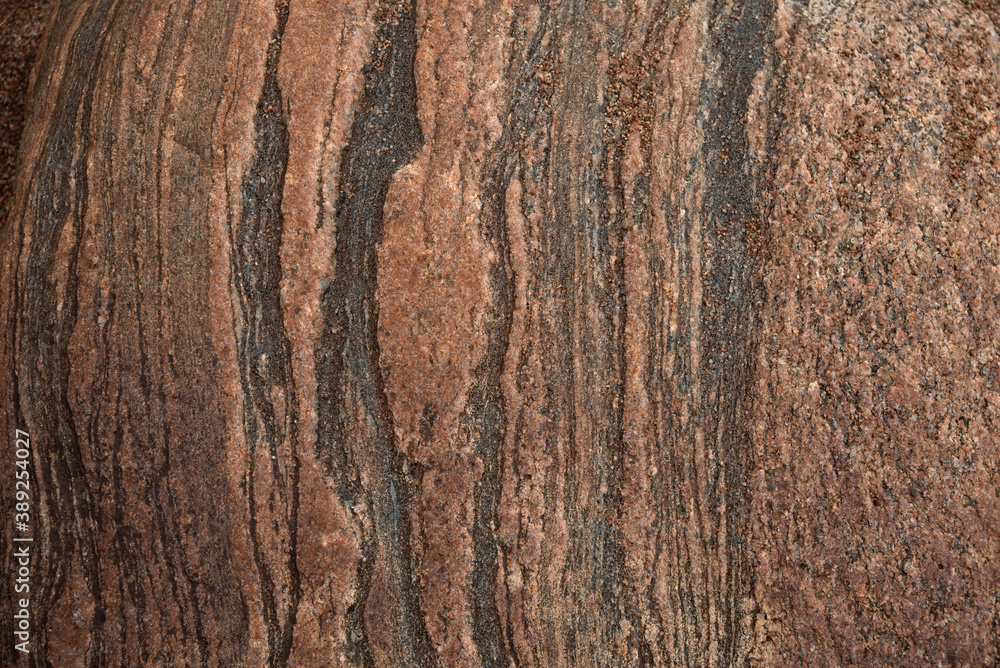 Granite surface treated with atmosphere and time, shot close-up Granite surface treated with atmosphere and time, shot close-up
