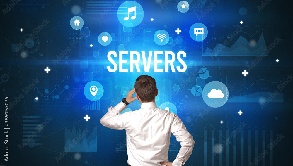 Rear view of a businessman with SERVERS inscription, modern technology concept Rear view of a businessman with SERVERS inscription, modern technology concept