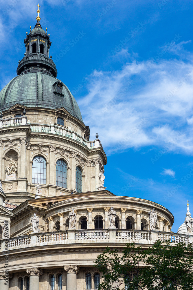 BUDAPEST, HUNGARY - JULY 15, 2019: St. Stephen's Basilica, exterior. Religious artwork and statues.