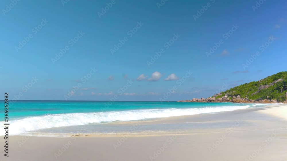 Beautiful beach on an exotic island with ocean and blue sky Beautiful beach on an exotic island with ocean and blue sky