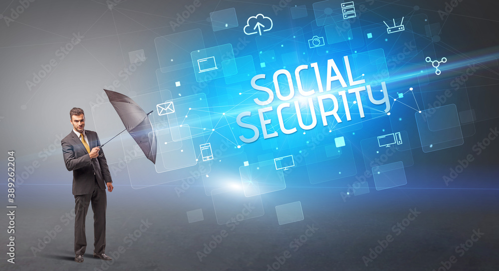 Businessman defending with umbrella from cyber attack and SOCIAL SECURITY inscription, online security concept Businessman defending with umbrella from cyber attack and SOCIAL SECURITY inscription, online security concept