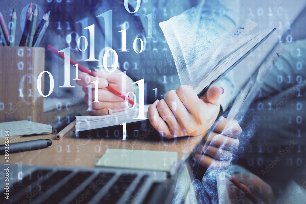 Fototapeta premium Double exposure of writing hand on background with data technology hologram. Big data concept.