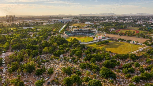 Aerial view of the cemetery and stadium Emilio Ibarra Almada home of the professional baseball team Los Cañeros de los Mochis of the Mexican Pacific League on October 30, 2020 in Los Mochis, Sinaloa M photo