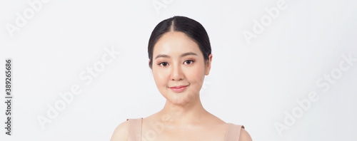 Young asian woman beauty face make up for skincare cosmetic and showing natural wellness soft and firm and ageless facial skin. she younger-looking or youthful. studio shot white background.