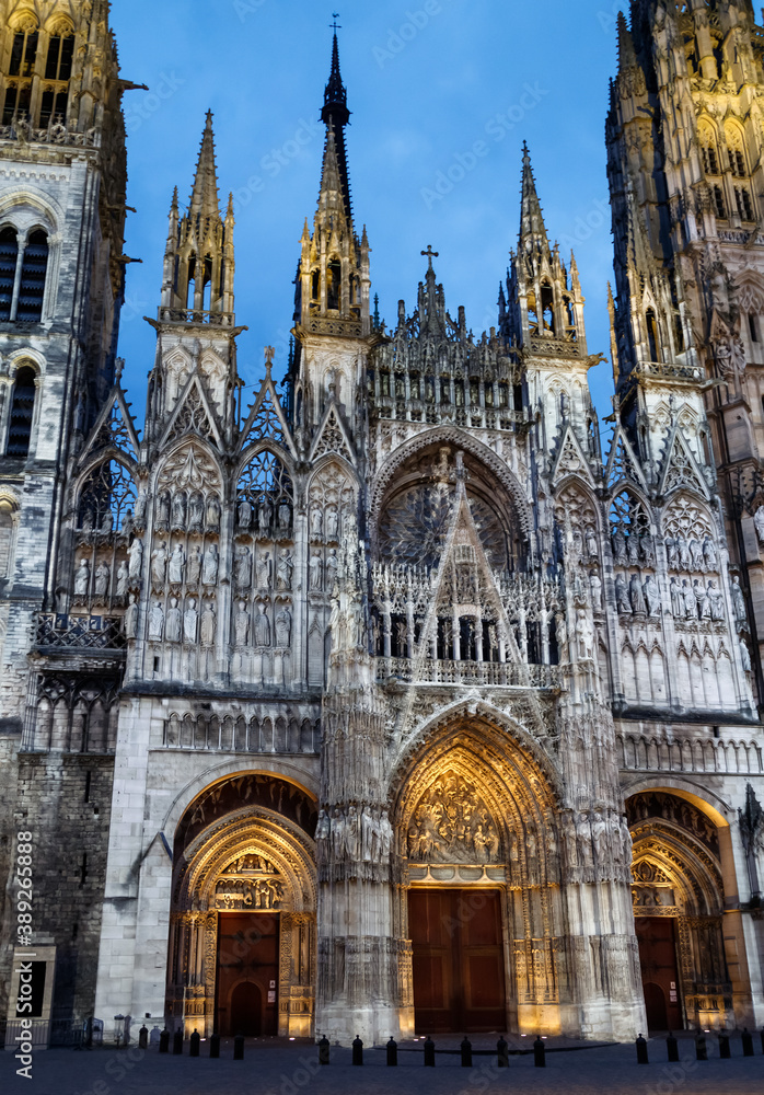 Rouen Cathedral (Cathedrale de Notre-Dame) in blue hour, landmark of Rouen, built in 1030, UNESCO world heritage site in France.