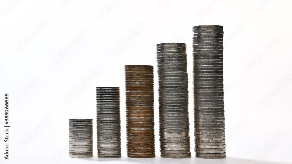 Coins on stack increasing on white background - stop motion Coins on stack increasing on white background - stop motion