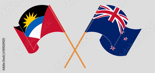 Crossed and waving flags of Antigua and Barbuda and New Zealand