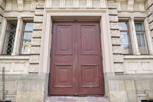 Old vintage wooden facade front brown door © Valerii Honcharuk