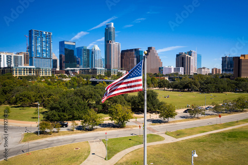 American flag in Front of the austin texas downtown skyline
