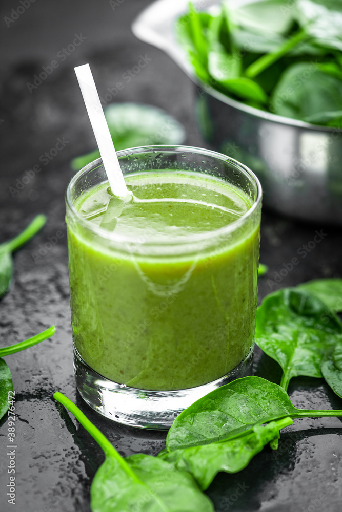 Freshly made spinach smoothie (close up; selective focus) Freshly made spinach smoothie (close up; selective focus)