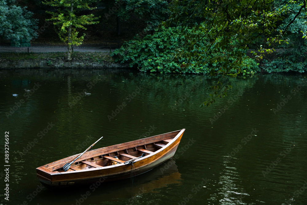 A lone boat stands in the lake. Calm quit background A lone boat stands in the lake. Calm quit background