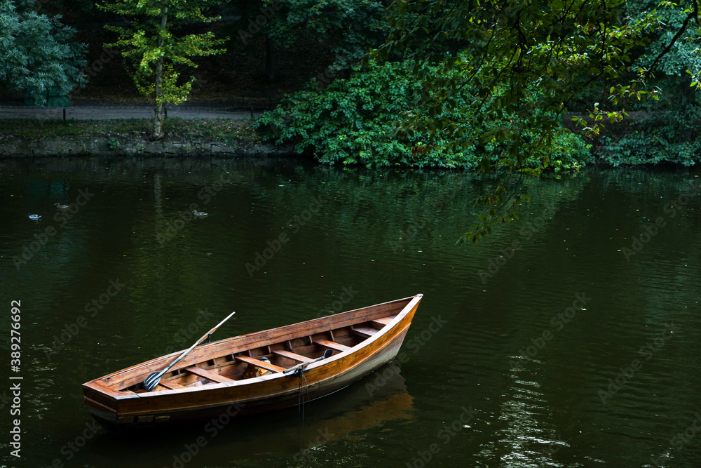 A lone boat stands in the lake. Calm quit background