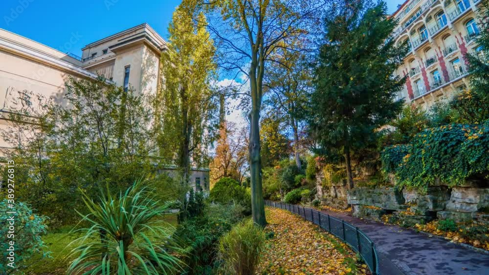 4k timelapse video of the cozy street with view of Eiffel Tower in Paris.Romantic view from a garden with golden yellow leaves on a cloudy autumn day in spring summer - wide horizontal panorama 4k timelapse video of the cozy street with view of Eiffel Tower in Paris.Romantic view from a garden with golden yellow leaves on a cloudy autumn day in spring summer - wide horizontal panorama