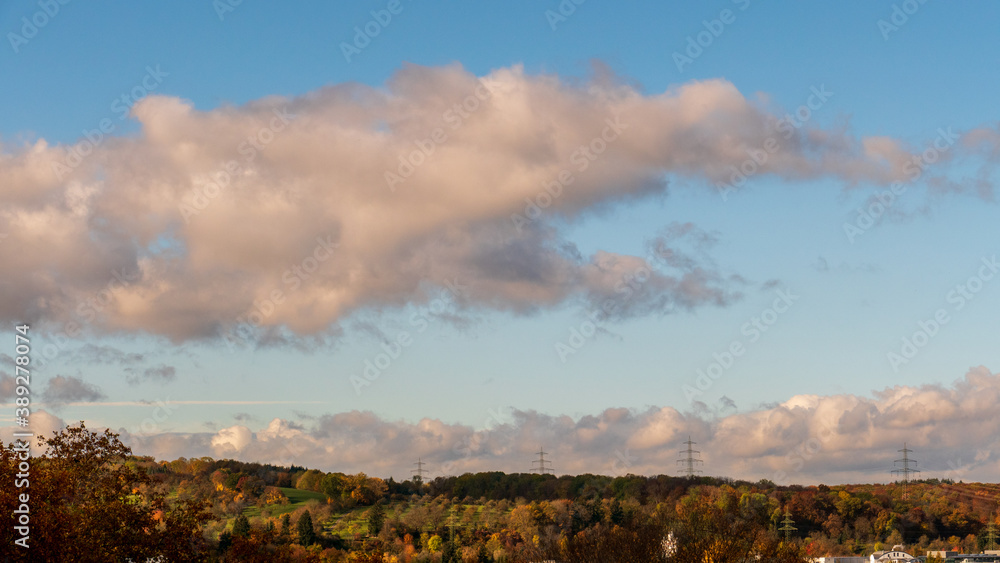 Fototapeta premium big grey cloud on the sky on a sunny day