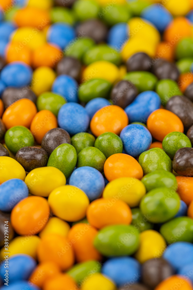Chocolate coated peanuts (close up; selective focus) Chocolate coated peanuts (close up; selective focus)