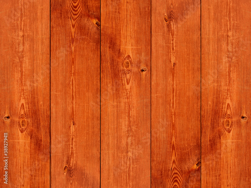 Vintage background orange wooden planks board texture.