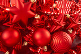 Red Christmas toys background. Christmas decoration. Perfect as a gift card. Place for text
