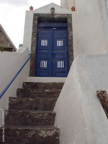 Magic Oia, Sanorini island Greece. Views of the historical part of the city of Oia. Streets and houses of the old city. photo