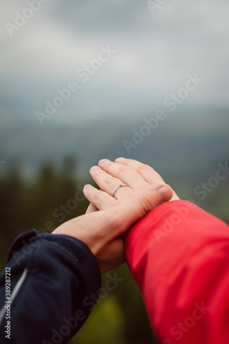 Two lovers got engaged in the mountains in autumn © Petr