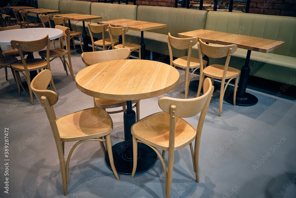 Wooden stools and wooden tables at cafe