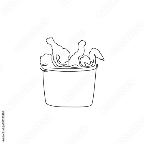 One continuous line drawing hot delicious American fried chickens on basket restaurant logo emblem. Fast food shop logotype template concept. Modern single line draw design vector graphic illustration