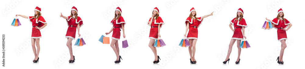 Young woman in red santa costume on white Young woman in red santa costume on white