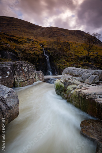 shot of the waterfalls in glen etive near loch etive and the entrance to glencoe and rannoch moor in the argyll region of the highlands of scotland during autumn