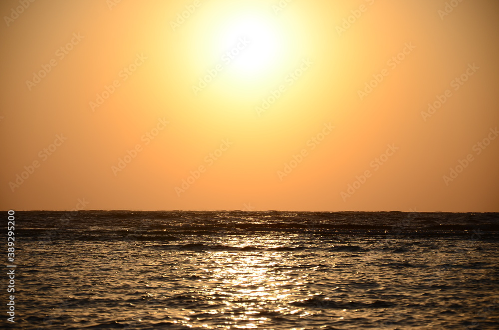 orange sunrise over the red sea
