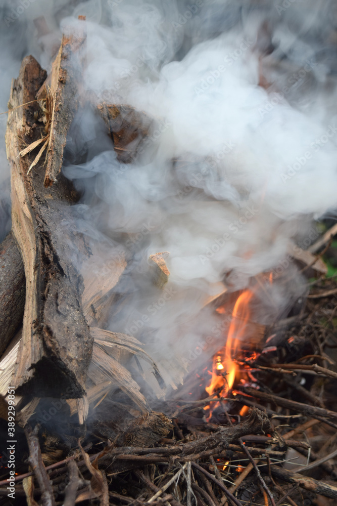 Thick swirling smoke comes from the fire Thick swirling smoke comes from the fire
