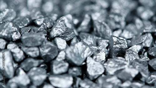 Heap of silver nuggets background (seamless loopable)