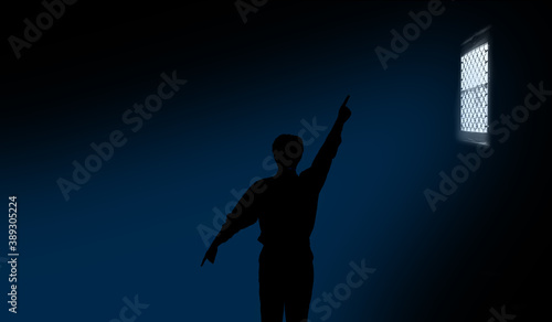 Shot of a man with hands stretched out like some clock hands and pointing the window light direction in a small dark room.