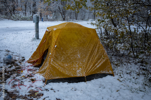 Winter camping tent in the snow. Cold weather camping