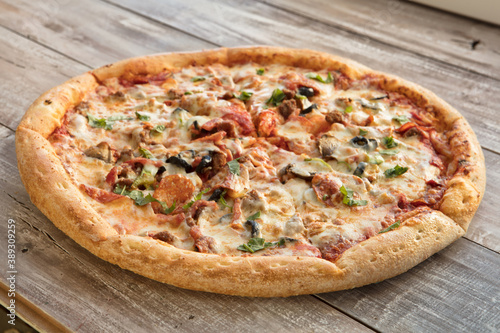 Pizza On A Wooden Table